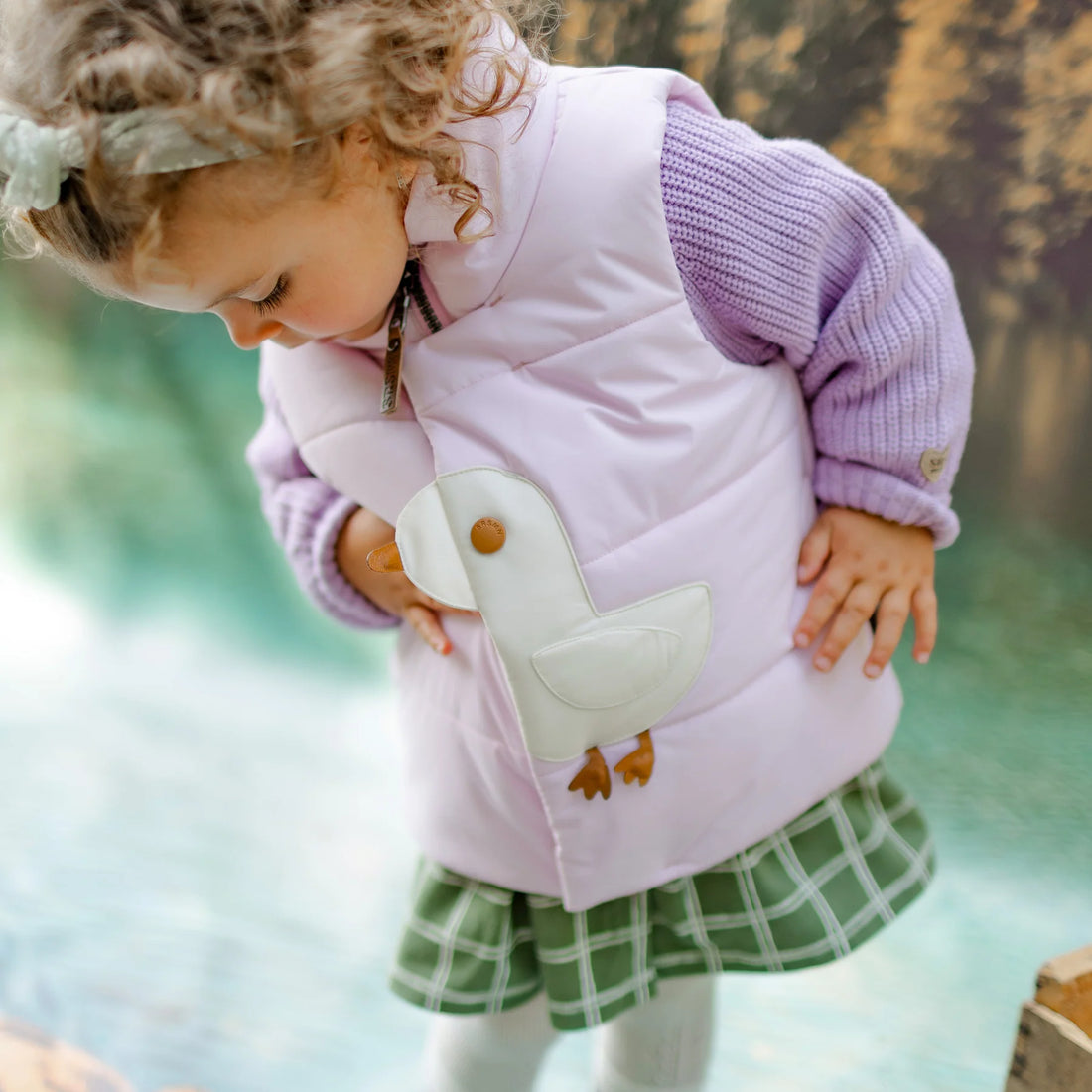 PINK SLEEVELESS PUFFER WITH A DUCK, BABY