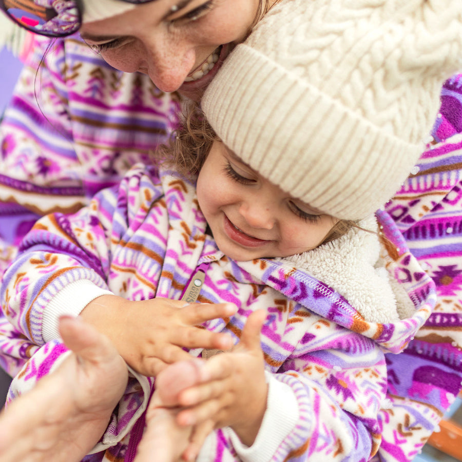 Purple and cream one piece with winter pattern and hood in fleece, baby